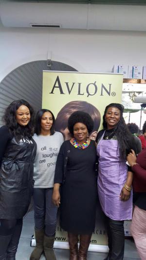 4 ladies posing inform on Avlon poster
