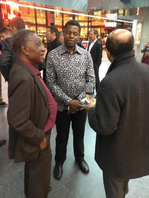 Inside Africa Geneva Airport opening men socializing
